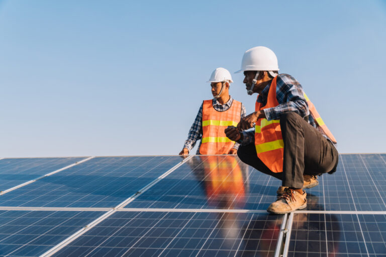 SolarSuccess Two Men Reviewing Solar Installation Process